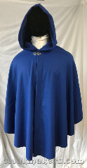 Cloak:3783, Cloak Style:Shaped Shoulder Ruana, Cloak Color:Cobalt Blue, Fiber / Weave:80% wool, 20% nylon, Cloak Clasp:Vale, Hood Lining:Cobalt blue cotton velveteen, Back Length:40", Neck Length:24", Seasons:Southern Winter, Spring, Fall, Note:A stunning cobalt blue shaped shoulder<br>ruana style cloak in a luxurious<br>wool blend.<br>Adorned with a silvertone<br>vale clasp and a cobalt blue<br>cotton velveteen hood lining.<br>Dry clean only..