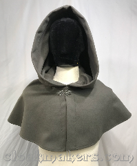 Cloak:3814, Cloak Style:Shaped Shoulder Cloak, Cloak Color:Sage Green, Fiber / Weave:100% wool, Cloak Clasp:Vale, Hood Lining:unlined, Back Length:12", Neck Length:20", Seasons:Winter, Southern Winter, Spring, Fall, Note:Made with luxurious and plush<br>100% wool fabric in<br>a sage green color,<br>this short shaped shoulder cloak<br>is sure to invite compliments<br>or at the very least keep you<br>feeling posh and warm.<br>Dry clean only..