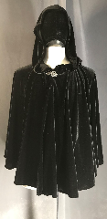 Cloak:3885, Cloak Style:Short Full Circle Cloak, Cloak Color:Black, Fiber / Weave:Polyester Stretch Velvet, Cloak Clasp:Vale, Hood Lining:unlined, Back Length:27", Neck Length:22", Seasons:Fall, Spring, Summer, Note:Simple but stunning short cloak of black<br>polyester stretch velvet with<br>a pewter vale clasp is just what you'd<br>want to add to your special outfit.<br>Draping beautifully, it's also<br>completely machine washable.