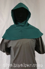 Cloak:H118, Cloak Style:Regular Hood, Cloak Color:Sea Green, Fiber / Weave:Wool blend suiting, Hood Lining:Unlined, Back Length:9", Neck Length:M - neck 24", Seasons:Spring, Fall, Note:This hood is a beautiful sea green color.<br>Wool blend suiting, has been<br>treated so that it's a little shinier<br>and softer than regular wool.<br>Dry clean only.<br>24" neck hole.<br>Pictured on tunic J526<br>Tunic not included..