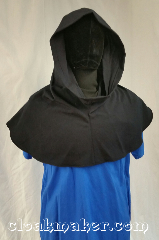 Cloak:H122, Cloak Style:Regular Hood, Cloak Color:Dark Navy Blue, Fiber / Weave:Wool, Hood Lining:Unlined, Back Length:10", Neck Length:L - neck 26', Seasons:Spring, Fall, Note:This hood is a dark navy blue,<br>almost black. 100% woo,<br>Dry clean only.<br>26" neck hole.<br>Pictured on tunic J501<br>Tunic not included..