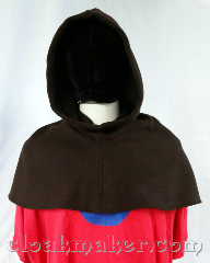 Cloak:H137, Cloak Style:regular, Cloak Color:Brown novelty weave, Fiber / Weave:80% wool, 20% nylon, Hood Lining:unlined, Back Length:8", Neck Length:M - neck 24", Seasons:Spring, Fall, Note:This hood is made from a wool blend and<br>has a brown novelty weave pattern,<br>almost a twill with hints of black throughout.<br>Dry clean only. 24" neck hole.<br>Pictured on tunic J549,<br>tunic not included..