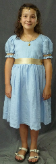 Gown ID:G737, Gown Color:Sky Blue, Style:Summer Alice in Wonderland Child Dress (approx size 8-12, shown worn by children size 6X and size 10-12), Sleeve:Short Sleeve with Russian medallion trim on bicep, Trim:Russian medallion trim on bicep and vintage lace on neckline, Neckline Type:Scoop, Fabric:100% Linen, Sleeve Length:12", Back Length:32".
