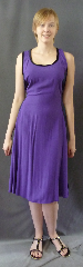 Gown ID:G759, Gown Color:Purple with tye-dye cherron side panels & back tie, Style:Dance dress, Sleeve:None, Trim:Black velvet piping around neckline and sleeve, Neckline Type:Round, Fabric:Cotton Blend, Back Length:45".