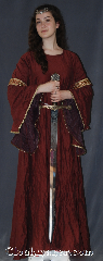 Gown ID:G919, Gown Color:Maroon, Style:12th Century<br>(Pictured with circlet<br>CT020151TH-ST<br>and belt BT0013ST sold<br>separately), Sleeve:Long Drop Sleeve with<br>Rusty Diamonds (Orange/Red/Gold)<br>trim on bicep<br>Gold picot lace on sleeve edge, Trim:Rusty Diamonds (Orange/Red/Gold)<br>trim on bicep<br>Gold picot lace on sleeve edge, Neckline Type:Scoop, Fabric:Polyester, Sleeve Length:30", Back Length:56".