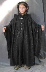 Robe:R186, Robe Style:Ritual Robe or Mage Robe, Robe Color:Black Sparkle, Front/Collar:Hooded with Antiquity clasp, Approx. Size:Youth 5 - 8 years old, Fiber:100% Polyester, Neck:20.5", Sleeve:23", Length:36", Height:Up to 4'.