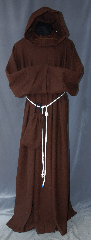 Robe:R288, Robe Style:Monks Robe with Attached cowl and pouch, Robe Color:Russet Brown, Fiber:80% 20% Wool Nylon, Neck:24", Sleeve:35", Chest:76", Length:60", Height:Up to 6', Note:This russet wool blend robe<br>has a woven texture reminiscent<br>of medieval times.<br>The attached hood and the matching<br>coin pouch and rope belt is included<br>with the option of a leather belt<br>for an added $44.<br>It can be warn as a complete outfit<br>with no extra pieces needed.<br>Perfect for outdoor events.<br>Dry Clean Only..
