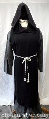 Robe:R434, Robe Style:Tabard, Robe Color:Black, Front/Collar:closed front, Fiber:100% Wool, Neck:28", Sleeve:none, Chest:open sides, Length:52", Note:A versatile piece for the working<br>monk. These are styled after the<br>tabbards that monks would wear<br>while healing the sick. They<br>needed something dark to mask<br>the questionable substances!.