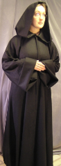 Robe:R43, Robe Style:Traveler's Robe, Robe Color:Black, Front/Collar:Hooded with Obiwan style cuff, Approx. Size:TBD, Fiber:Wool Flannel, Neck Length:21", Sleeve:37", Chest:40", Length:57", Height:5'7", Note:$199 and up depending on fabric and size.