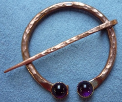 Hammered Copper Penannular with faux
                        amethyst stones